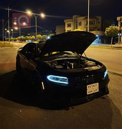 دۆج چارجەر